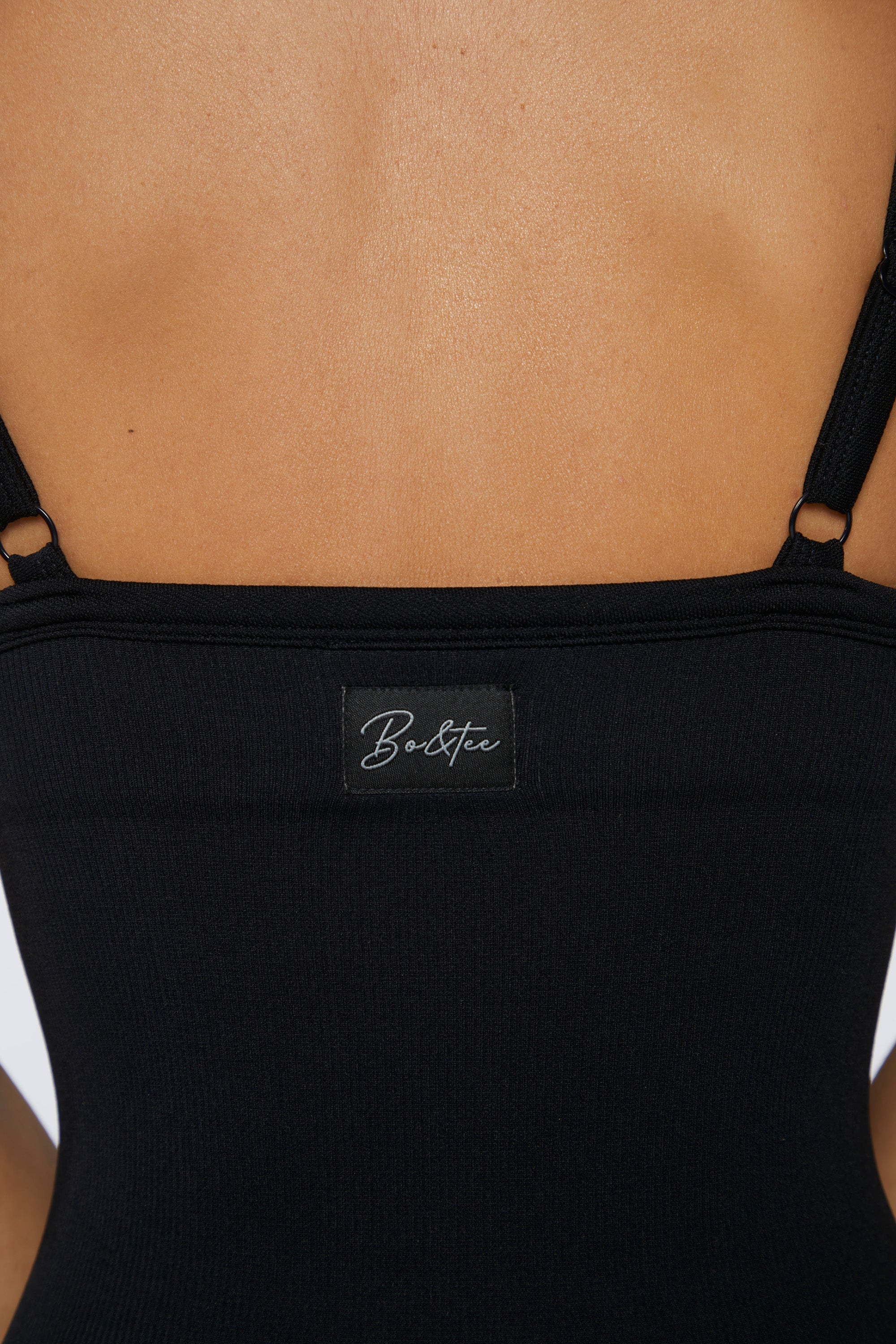 Seamless Micro Rib Scoop-Neck Unitard in Black