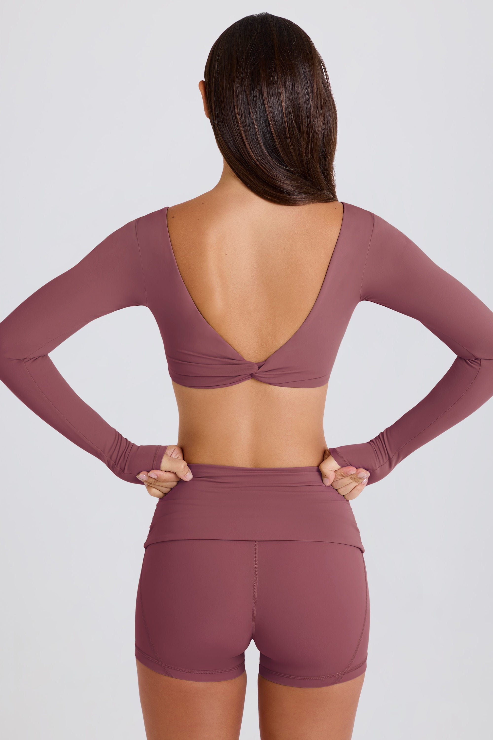 Four-Way Stretch Foldover Mid-Rise Mini Shorts in Acai