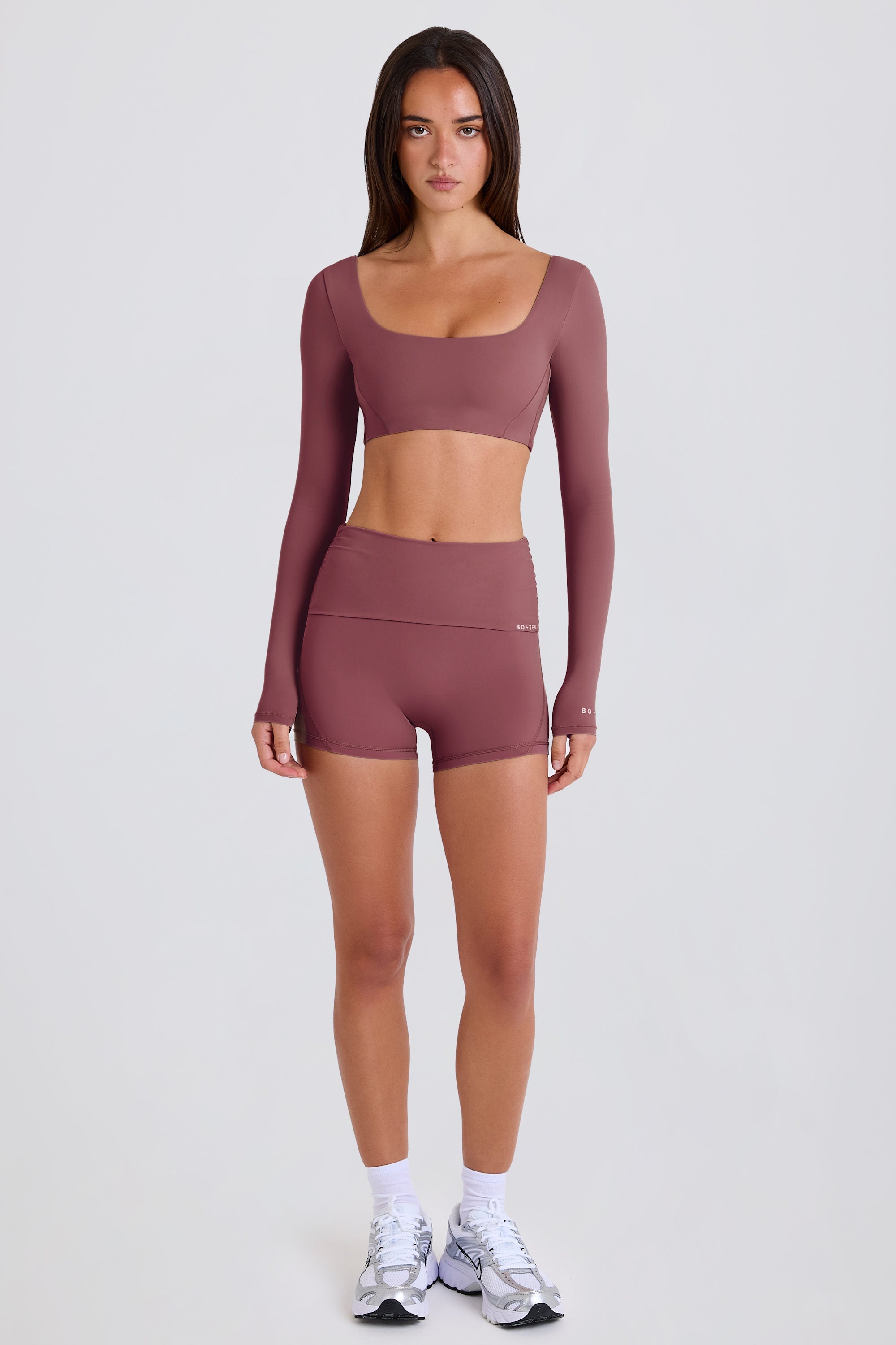 Four-Way Stretch Foldover Mid-Rise Mini Shorts in Acai