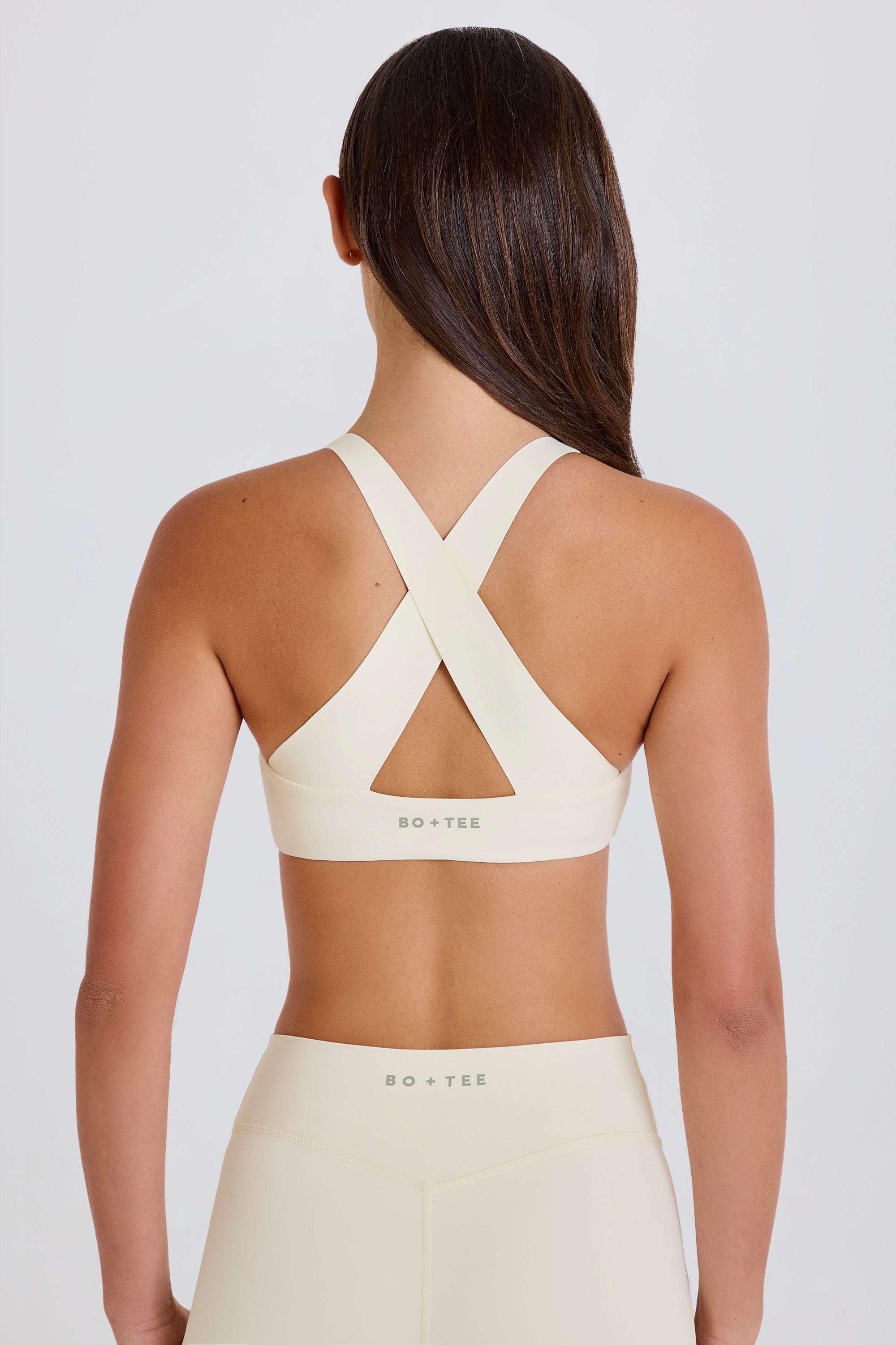 Four-Way Stretch Crossback V-Neck Sports Bra in Cream